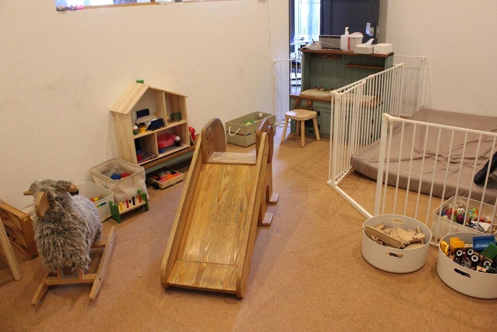 The kids' room is full of books and toys.